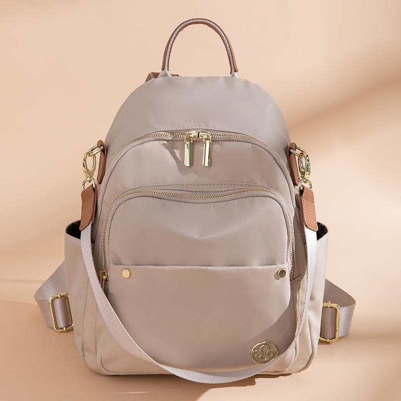 多口袋大容量女士尼龙背包轻便防水书包牛津布时尚旅行防盗双肩包