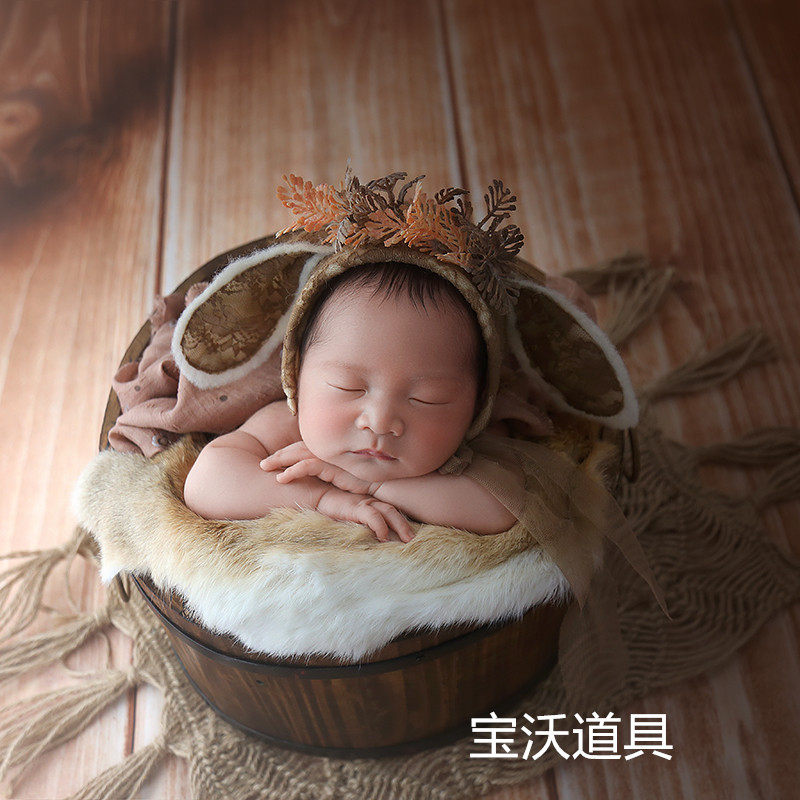 新生儿满月照摄影主题宝沃道具
