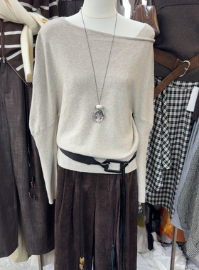 十三行现货2025秋冬新款韩版时尚斜肩露肩长袖针织毛衣K68280W112