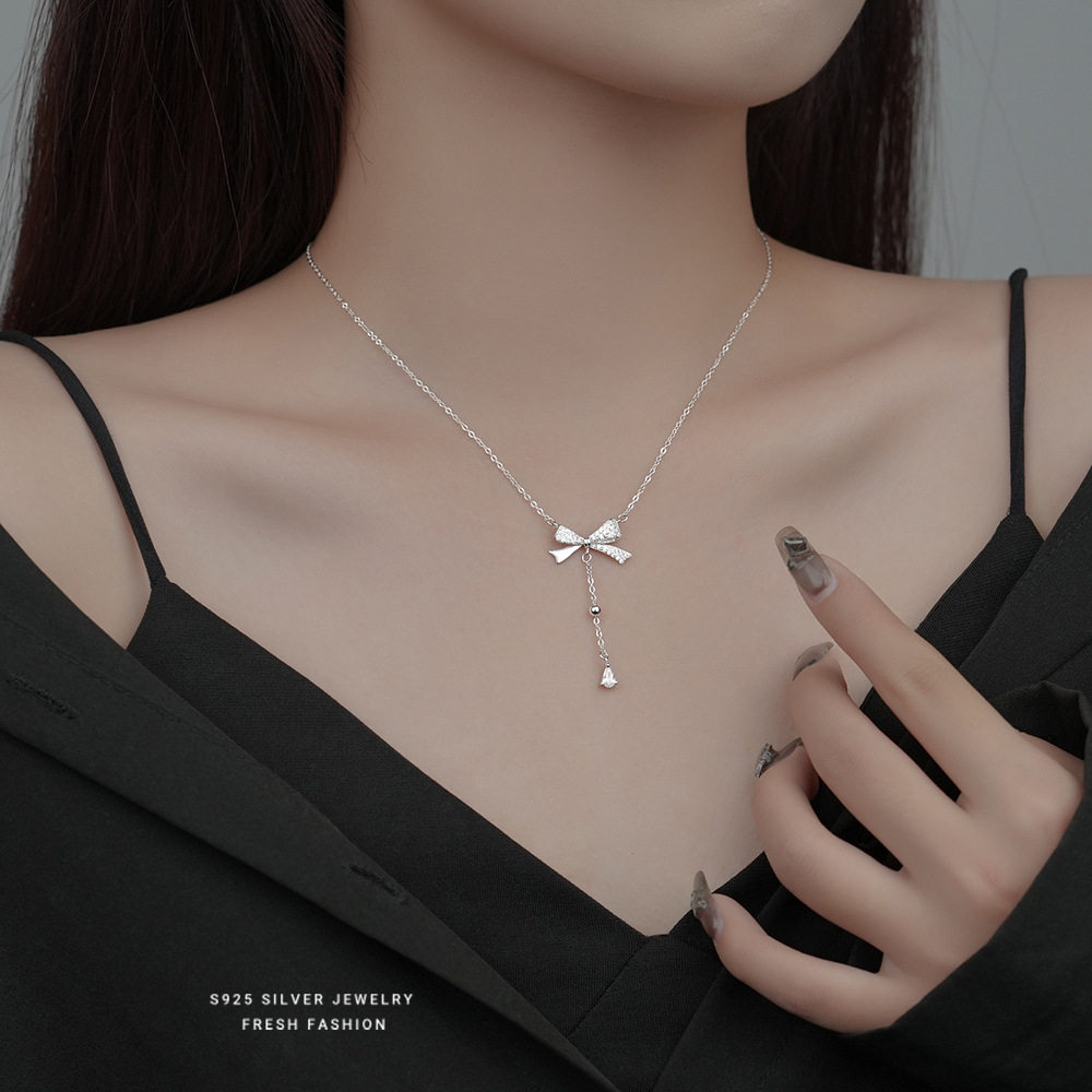 s925纯银微镶蝴蝶结水滴吊坠女轻