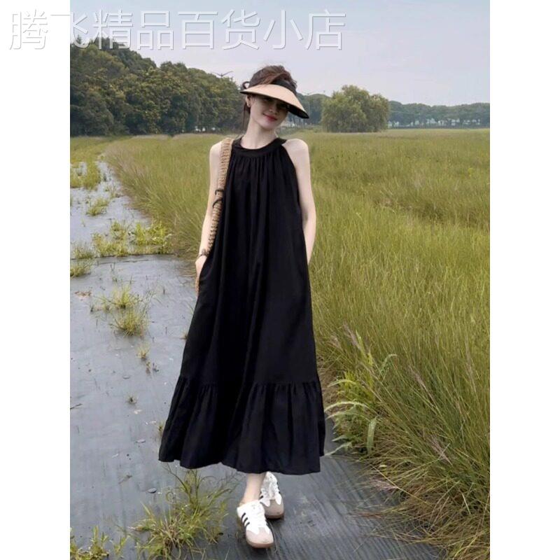 海边度假风挂脖连衣裙女2026夏季新款法式黑色宽松旅游气质长裙子