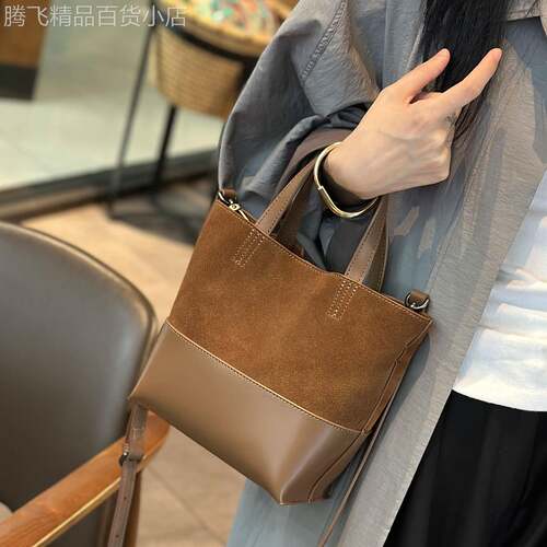 法国正品MK Jessie真皮包包女式2026新款大容量水桶包手提斜挎包