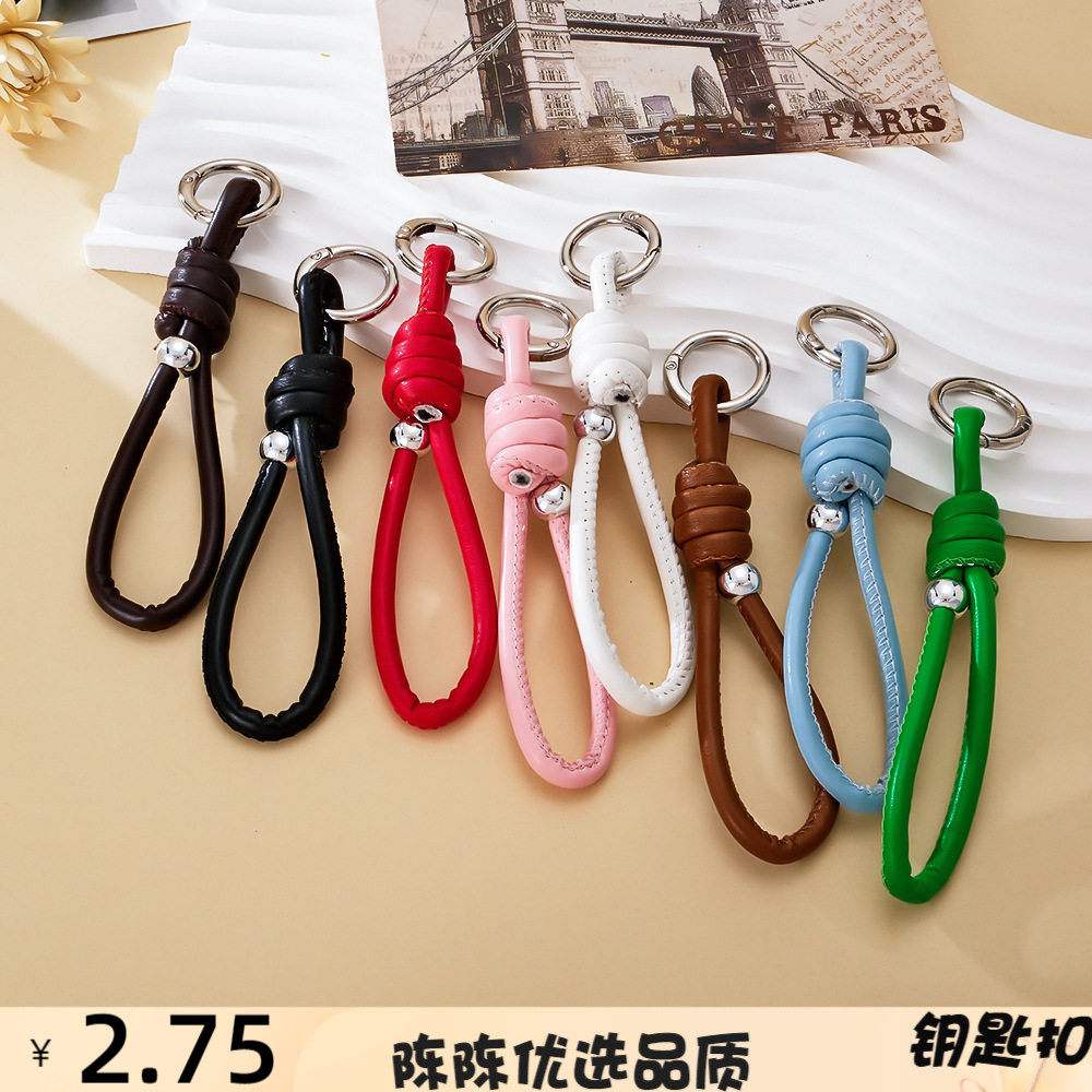 时尚彩色手工编织罗马结皮绳手机