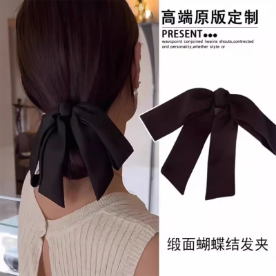 气质低丸子头黑色缎面蝴蝶结发夹
