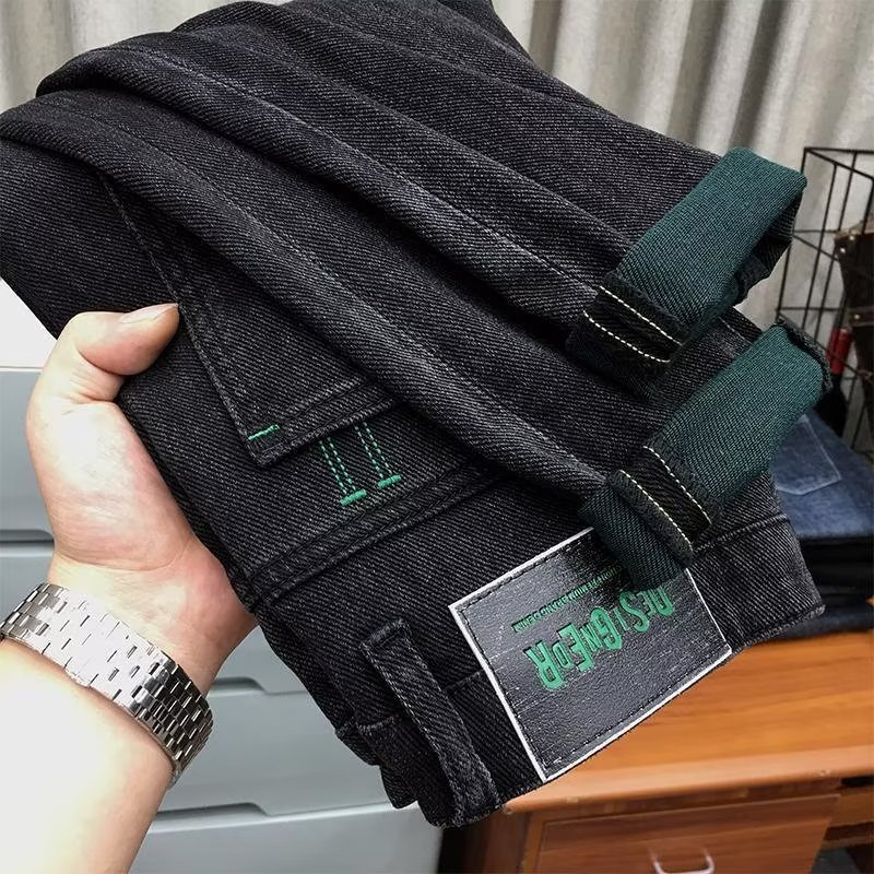 外贸剪标余单烫印春秋款牛仔长裤男弹力修身小脚裤欧洲站休闲裤子