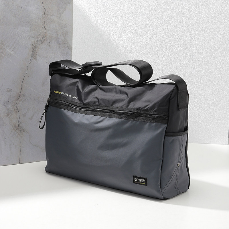 时尚休闲斜挎包男士包包大容量单肩包牛津布男包2026新款帆布背包