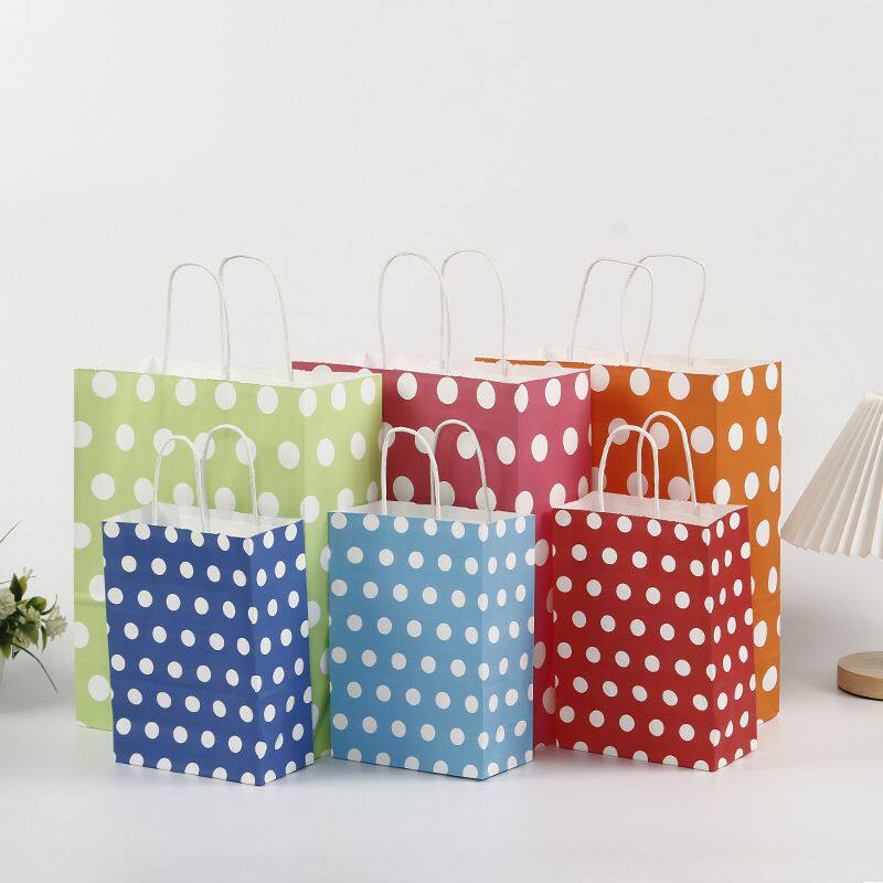 现货白牛皮纸手提袋创意彩色波点购物袋时尚可爱礼品包装纸袋