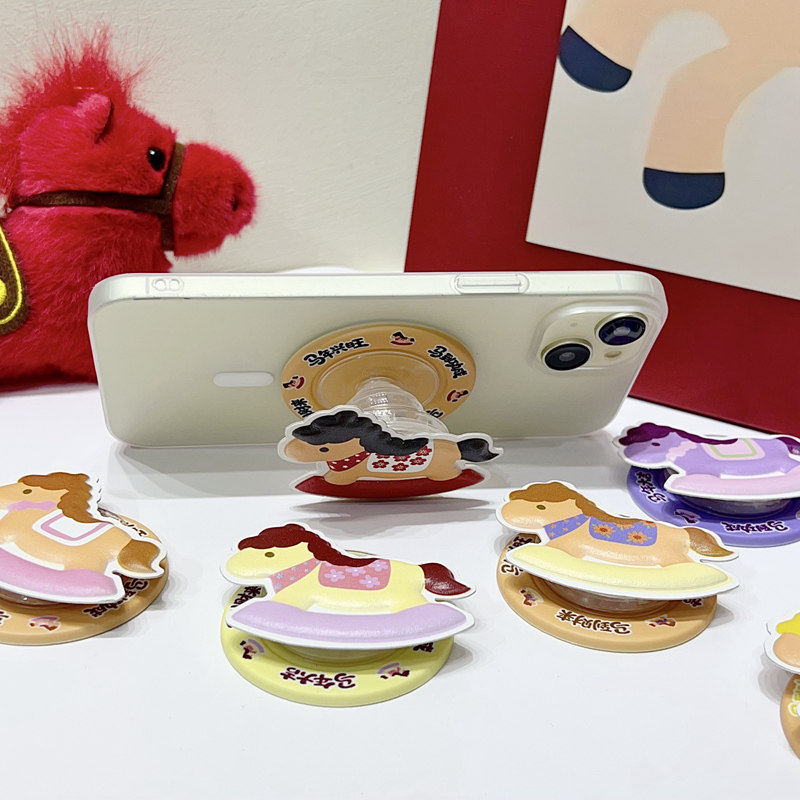 NUOPAISI摇摇乐皮质木马气囊磁吸支架马年新款卡通手机皮革纹支架适用MagSafe磁吸支架强吸附懒人神器桌面