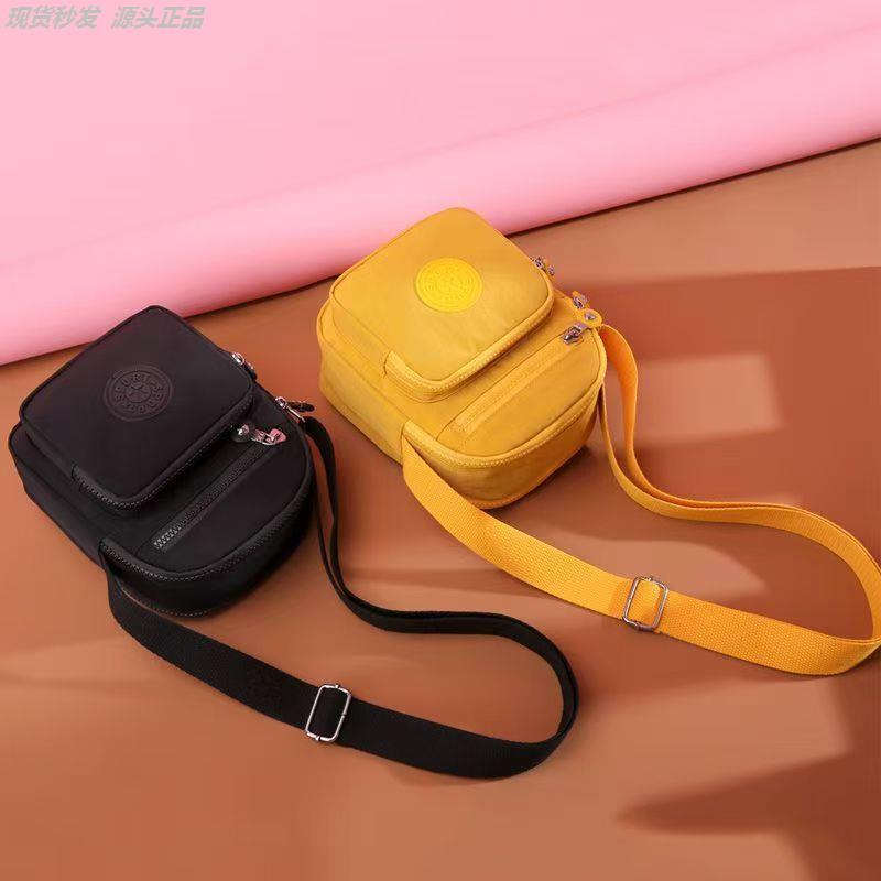 手机包女斜挎2025新款迷你小包包帆布包潮百搭竖款单肩钥匙零钱包