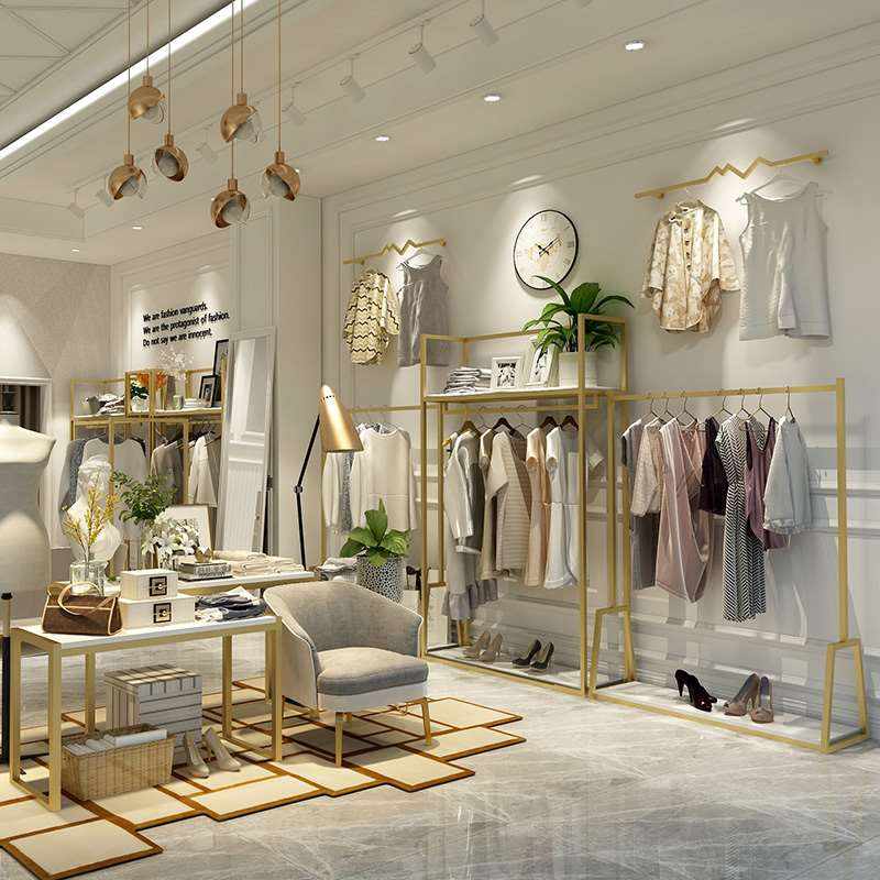高档北欧服装店展示架落地式金色货架挂衣架女装店装修设计效果图