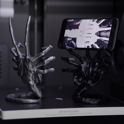异形手办抱脸虫手机支架