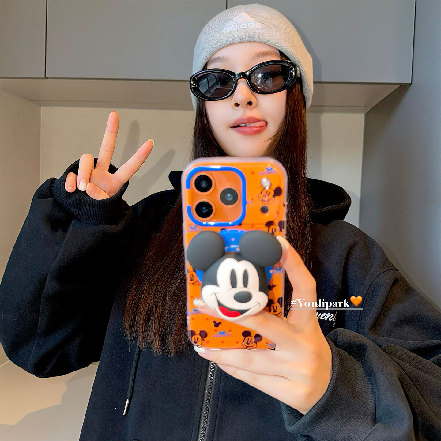 星宇橙卡通磁吸支架苹果手机壳女