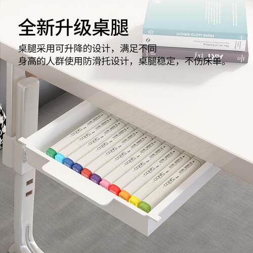 A small adjustable and foldable study desk on the bed