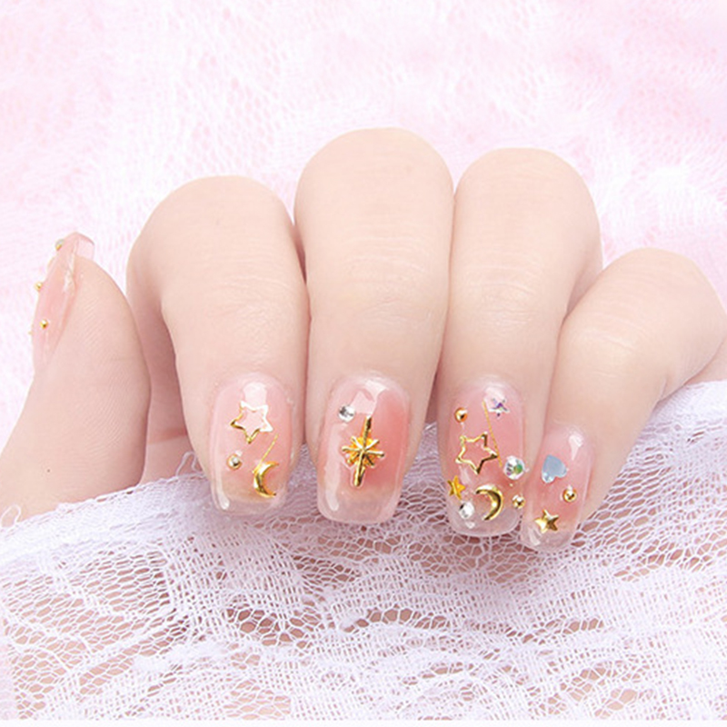 美甲饰品星月铆钉日系镂空指甲装饰合金镶钻网红爆款铜片组合饰品