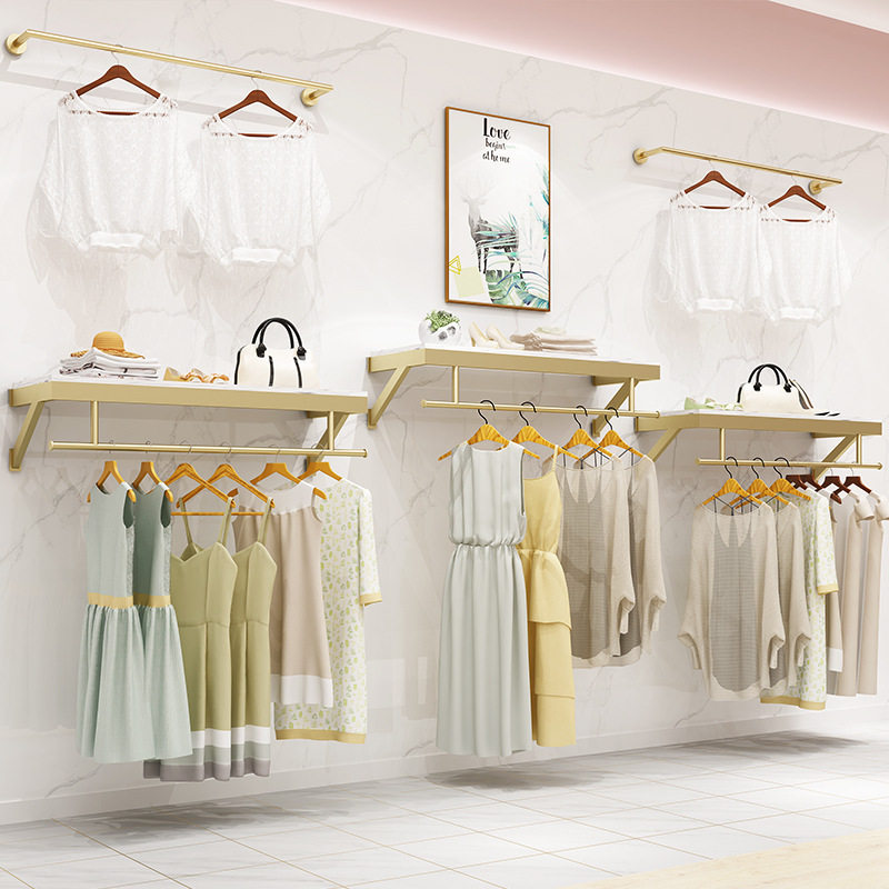 男女服装店上墙挂衣架壁挂式服装展示架童装店墙壁装修金色货架