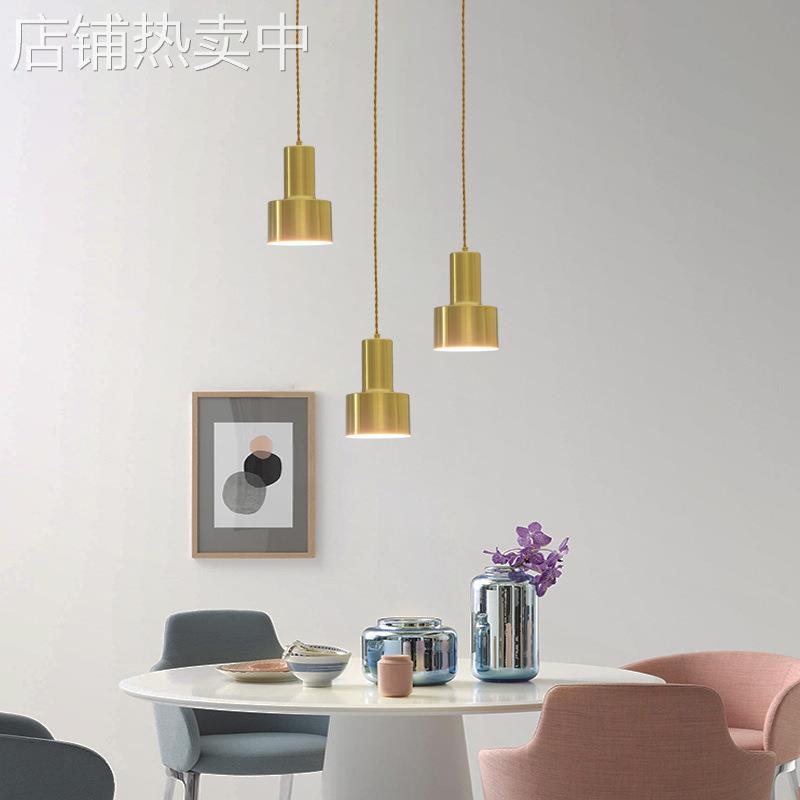 北欧金色黄铜色简约现代手电筒时尚餐厅吧台灯设计单头服装店吊灯
