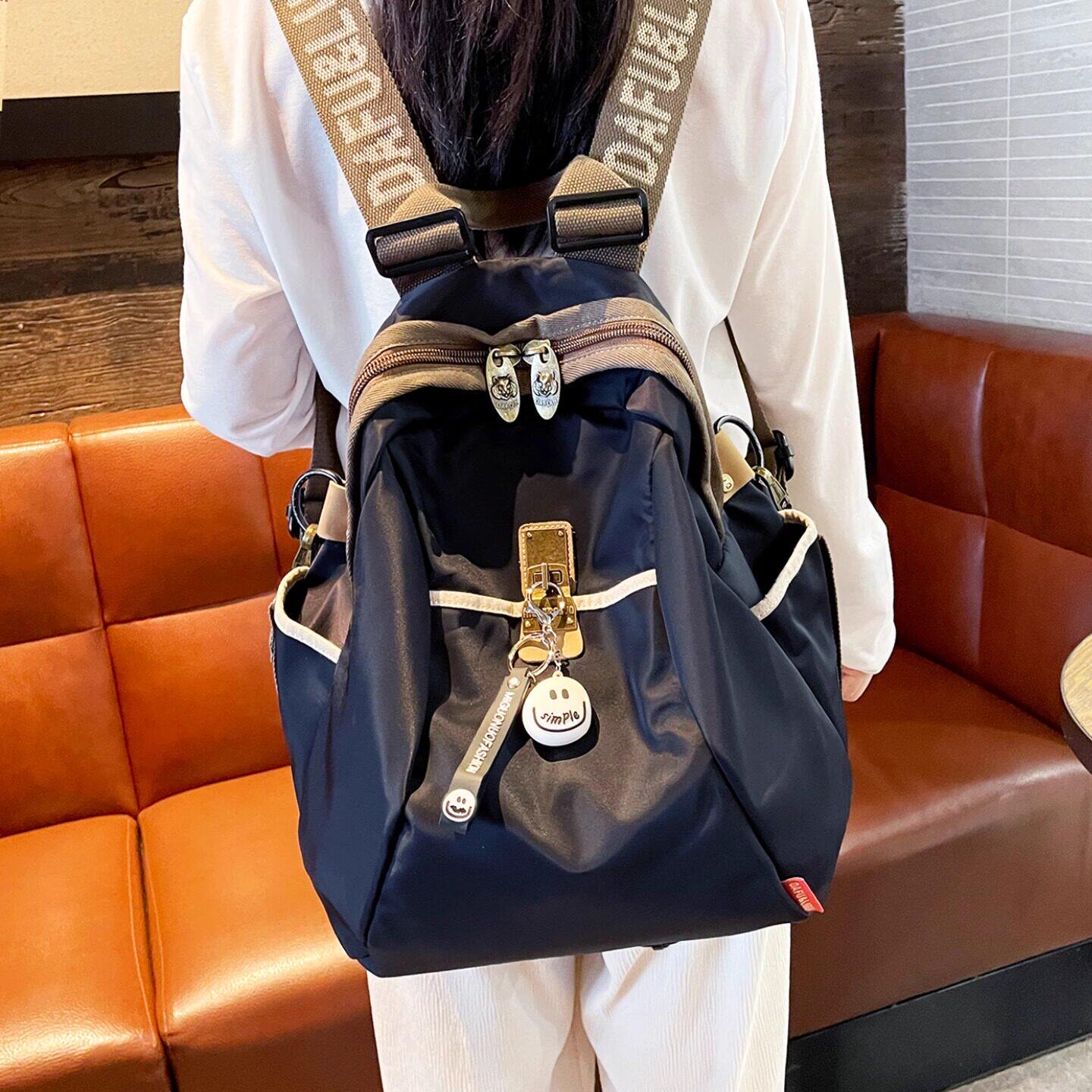 法国DUDK品牌大容量牛津布双肩包女新款高级感背包轻便旅行登山包