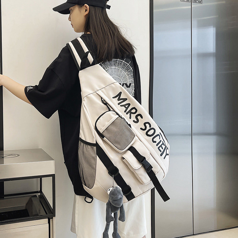 背包女2026新款时尚书包大容量字母运动情侣防水男士旅游斜挎包男