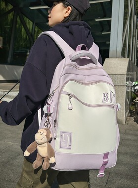 法国正品MK DN~书包男新款初中高中生大容量减负护脊双肩包女背包