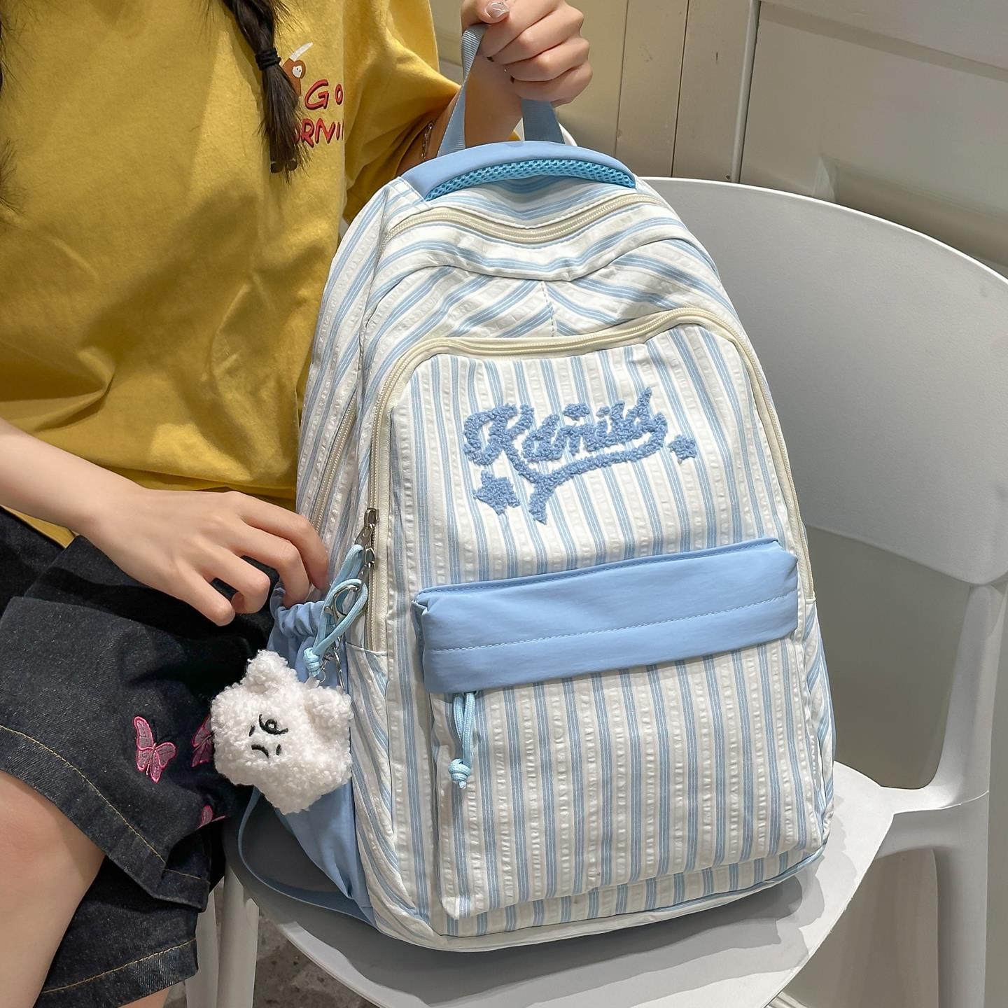 韩版条纹减负小学生书包女中学生初中生双肩包女2025新款轻便背包