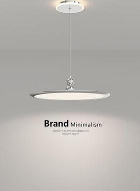 The chandelier at the restaurant is a modern, approximately