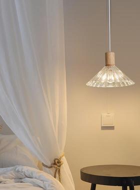 The chandeliers at the logwind restaurant are modern, simple