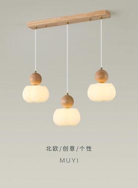 The chandelier at the Woodwind Restaurant is about modern an