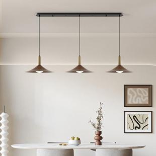 the Central The Room. room Dining tablelig chandelier