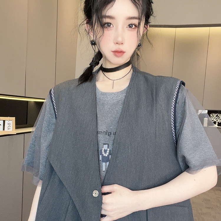 马甲女2026春季新款拼接不规则下摆单排扣马夹中长款外套无袖上衣