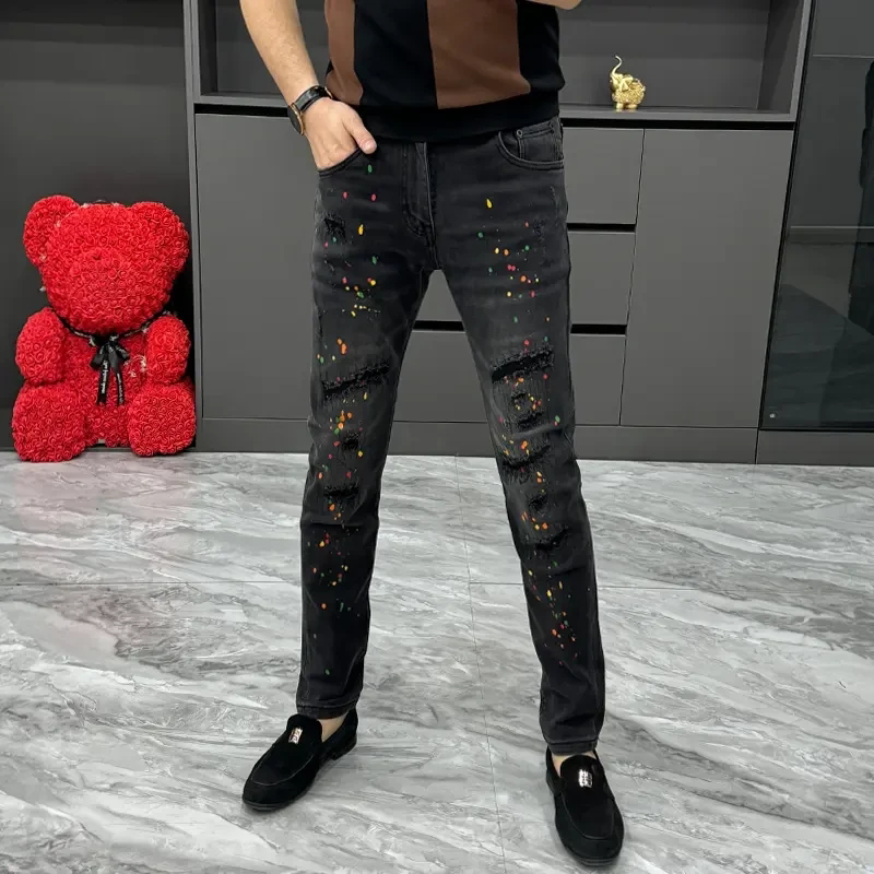 欧美潮牌泼墨破洞牛仔裤男士修身帅气小脚裤弹力百搭潮流休闲长裤