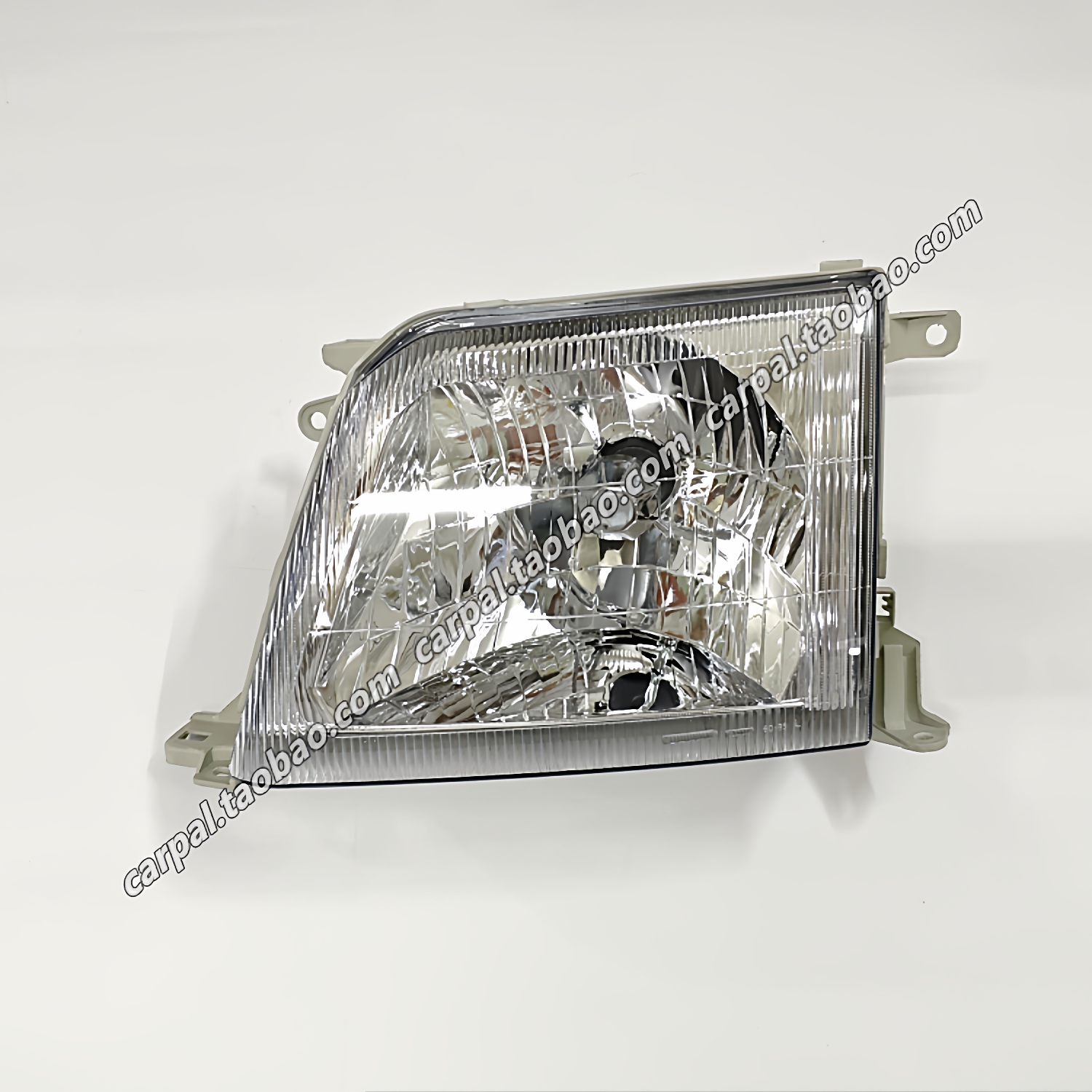 96-02款霸道陆霸3400前大灯