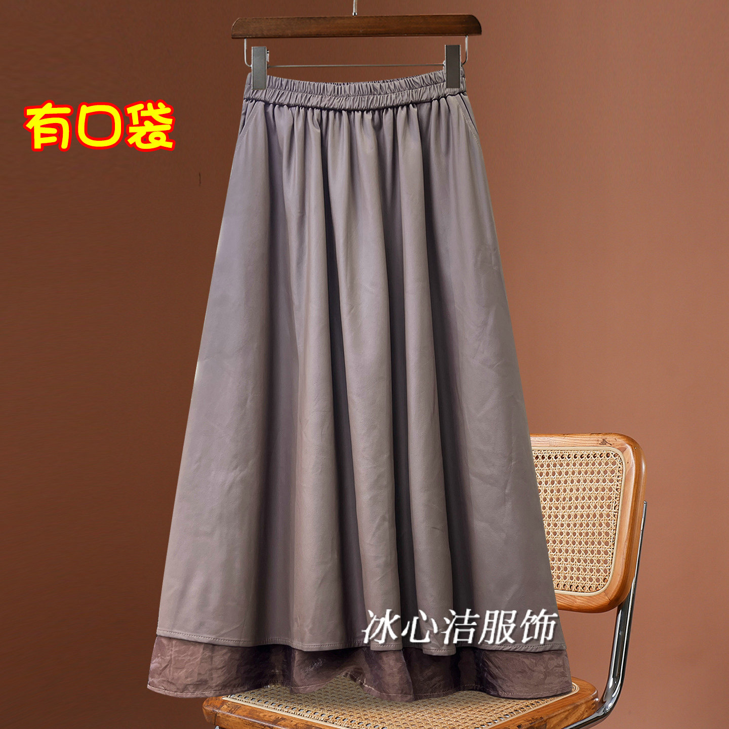 设计感口袋Pu皮A字半身裙
