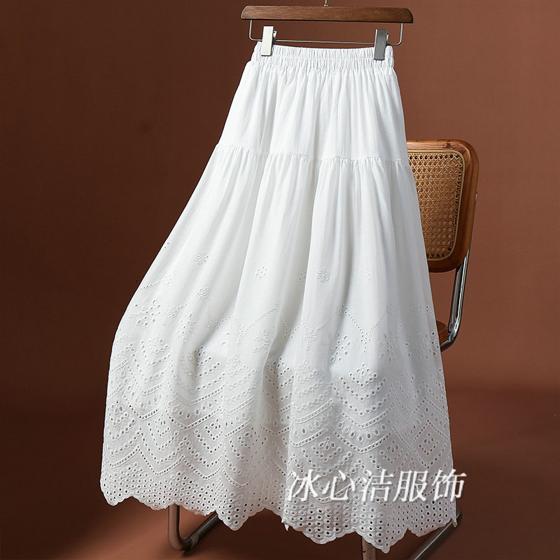 白色重工镂空刺绣设计半身裙2025新款时尚不规则下摆高腰a字长裙