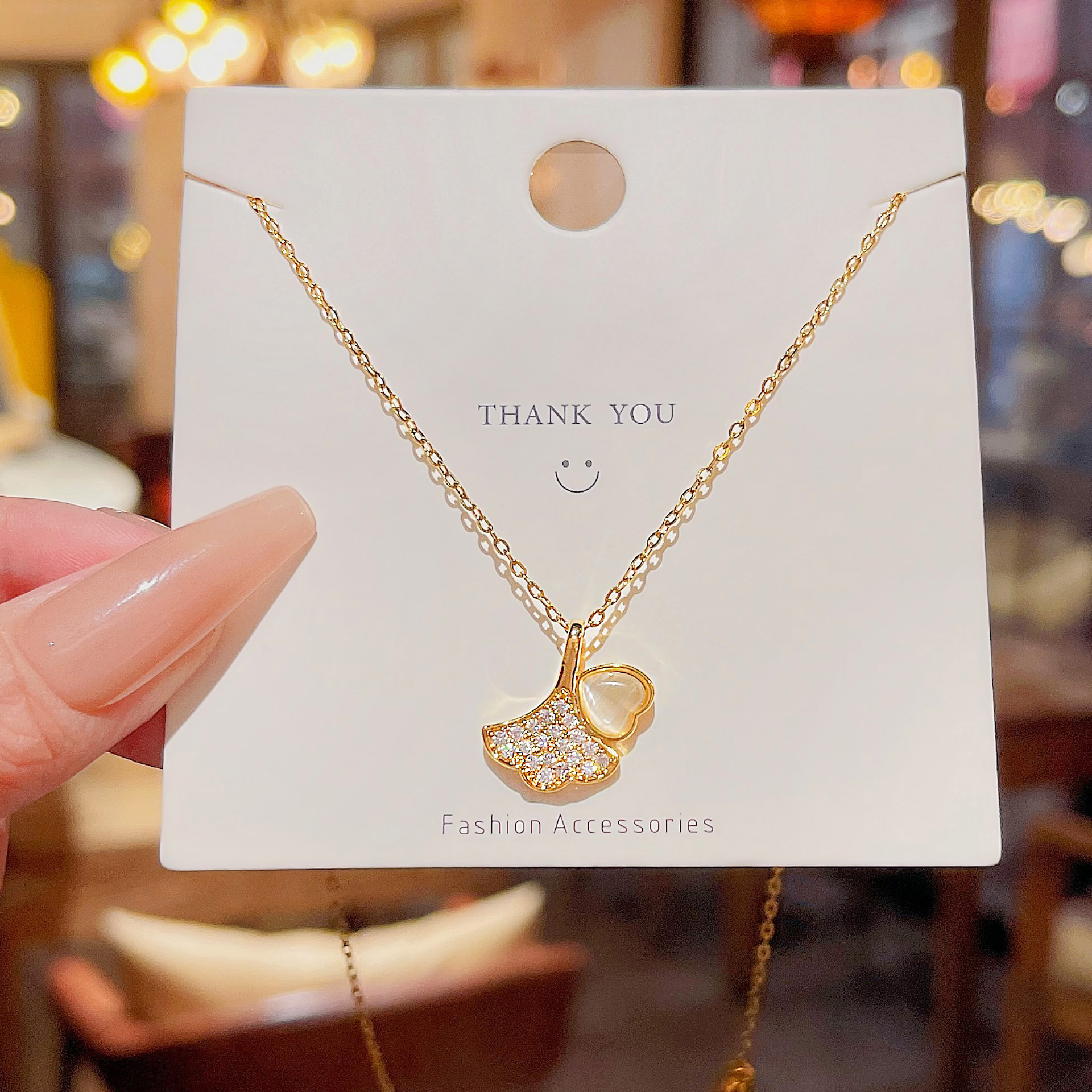 时尚轻奢叶项链小众微镶锆石小扇子吊坠钛钢锁骨链韩版饰品女