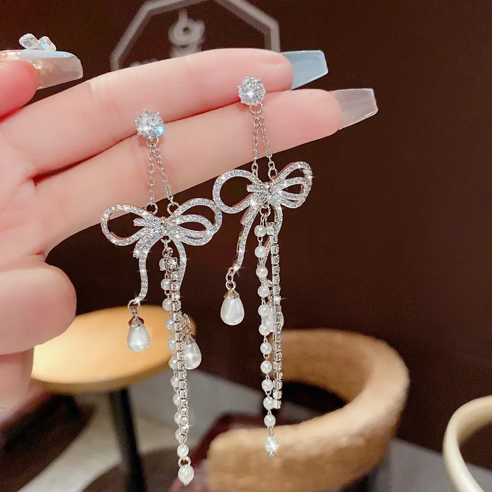 925银针精致蝴蝶结轻奢珍珠耳环简约高级感耳钉气质长款流苏耳饰