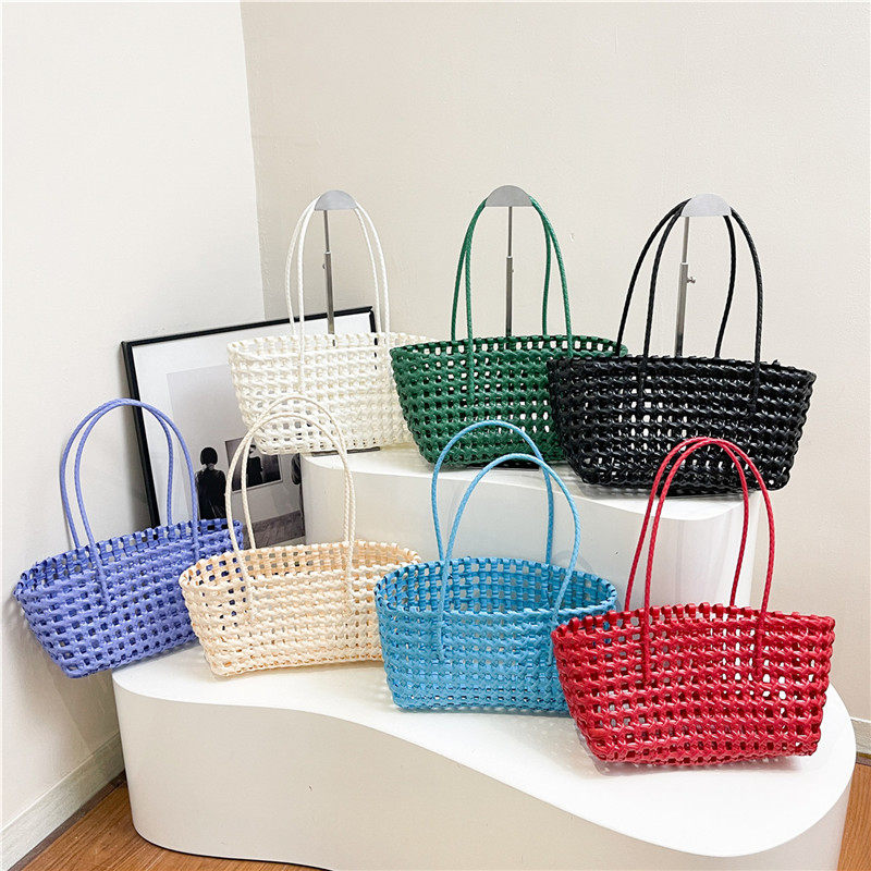 韩国休闲2026新款镂空编织包菜篮子沙滩春编织篮子购物腋下单肩包