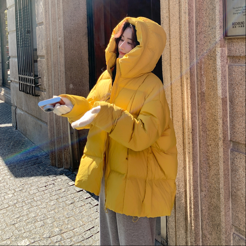 黄色连帽羽绒服女2025冬季新款