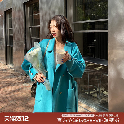 蓝色双排羊毛大衣女中长款系过膝