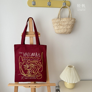 轻帆韩版ins日系红色质感帆布单肩包简约流行精致布袋学生包