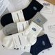 5双 中短筒袜纯棉吸汗透气男女袜子潮流ins字母白色运动袜 春夏季