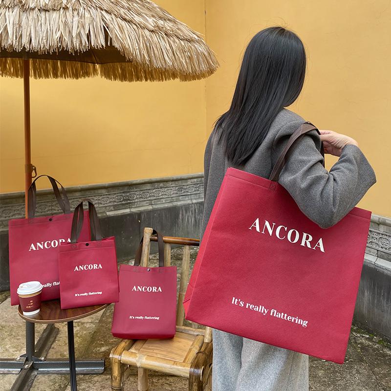 安可拉红暗扣服装店袋子壹选