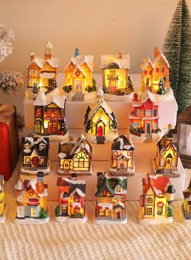 Christmas decorations, colorful glowing house tabletop