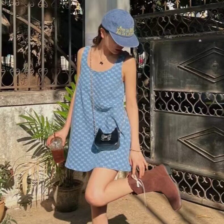 韩国东大门A字牛仔吊带短裙子女夏季新款纯欲风露背蝴蝶结连衣裙