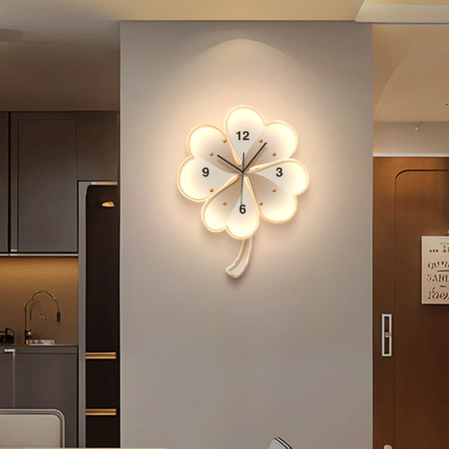 会摇摆的奶油简约钟表挂画