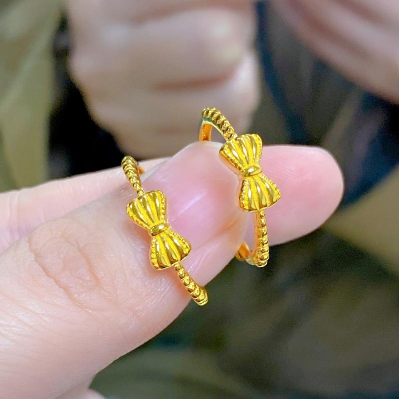 5G黄金蝴蝶结戒指女999足金在逃公主可爱秀气麻花指环纯金送女友