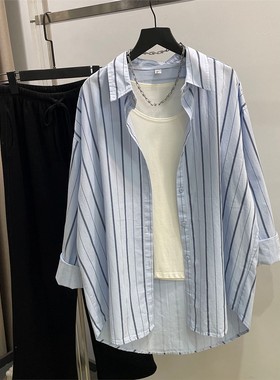 慵懒的蓝色条纹衬衫女士宽松设计修身Look前短后长纯棉衬衫秋外开