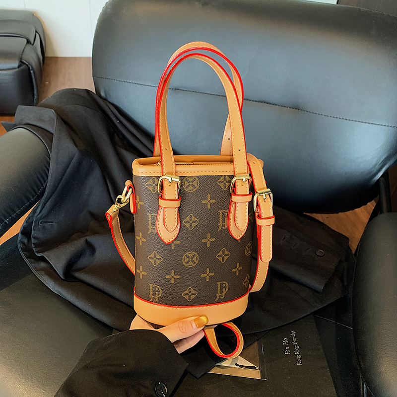 手机包单肩斜挎包迷你水桶包