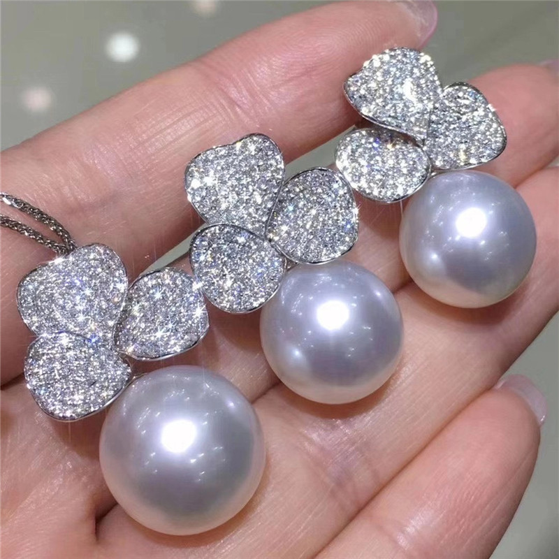 澳洲白珠御木本经典款套装耳钉吊坠18k白金钻石套装正圆极光质感