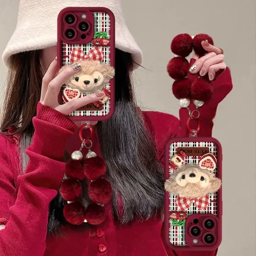 毛绒雪莉玫公仔手链适用苹果16手机壳15pro圣诞节14磨砂硅胶7/8女