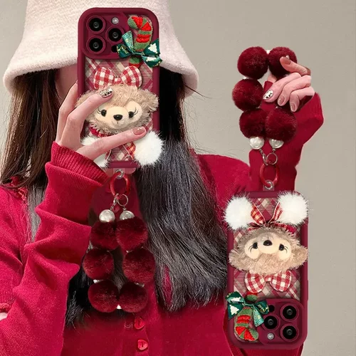 圣诞毛绒雪莉玫公仔链条适用苹果16手机壳15pro全包防摔14可爱7/8